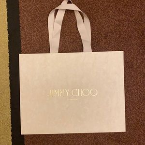 Small Jimmy Choo cream shopping bag gold letters